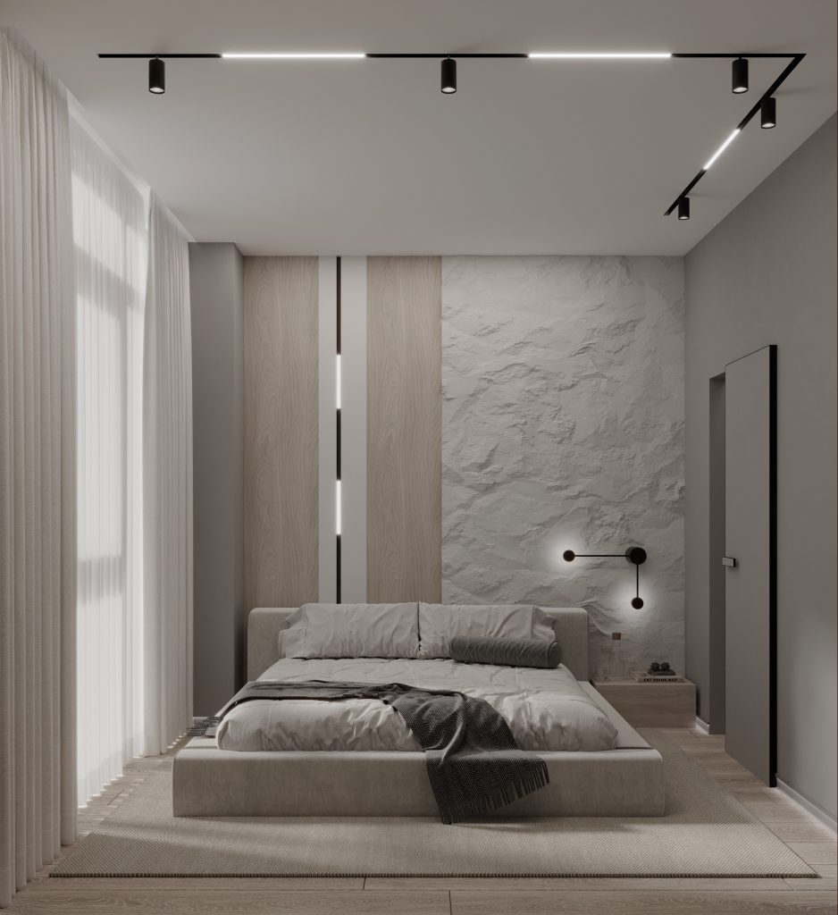 Minimalist bedroom with a textured accent wall and track lighting